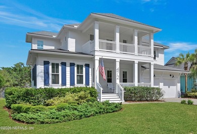 Walk or bike to the beach from this beautifully designed - photo 1