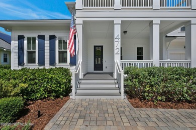 Walk or bike to the beach from this beautifully designed - photo 4