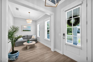 Walk or bike to the beach from this beautifully designed - photo 7