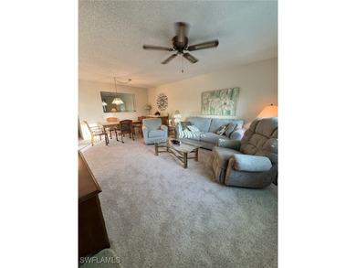 Step into a bright and inviting 2-bedroom, 2-bath condo with an - photo 3