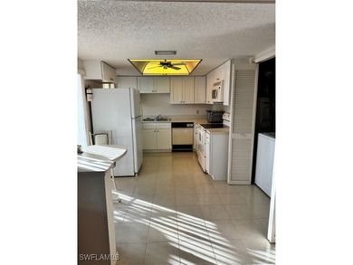 Step into a bright and inviting 2-bedroom, 2-bath condo with an - photo 6