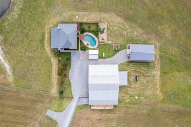 Welcome to this exceptional 33.9-acre, ag-exempt, fully fenced