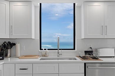 Introducing an oceanfront masterpiece! This unit has been - photo 11