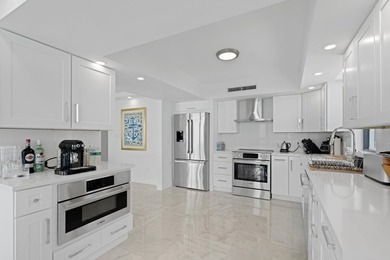 Introducing an oceanfront masterpiece! This unit has been - photo 12