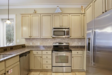 Set on a prime corner lot within the Bungalos at Sandestin, this - photo 13