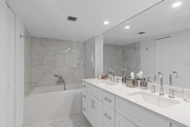 Introducing an oceanfront masterpiece! This unit has been - photo 17
