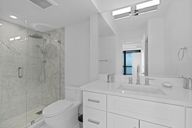 Introducing an oceanfront masterpiece! This unit has been - photo 20