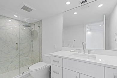 Introducing an oceanfront masterpiece! This unit has been - photo 22