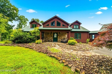 Stunning log home on the main channel of Douglas Lake! This - photo 4