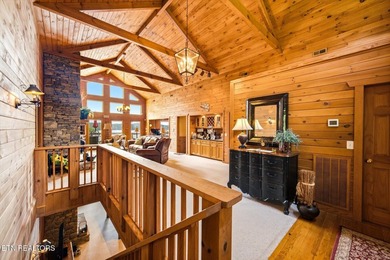 Stunning log home on the main channel of Douglas Lake! This - photo 6