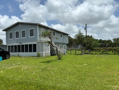 A big house on a big lot for this section of Holiday Beach! - photo 1