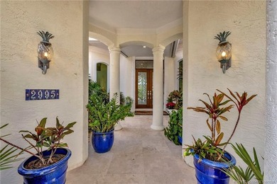 This elegant Sailfish Point estate is ideally positioned on the - photo 8