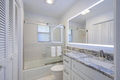 This beautiful home boasts two bedrooms and two baths, with the - photo 11