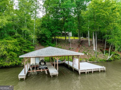 AMAZING LAKEFRONT PROPERTY WITH AMAZING LOT!! Nearly 200ft of - Lake Home For Sale in Sparta, Georgia