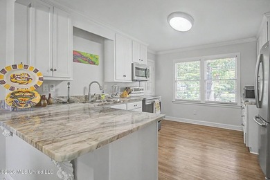 Welcome home to the heart of Bayou View! This beautifully newly - photo 7