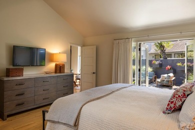 This exquisitely updated townhome enjoys privacy, sunshine, and - photo 16