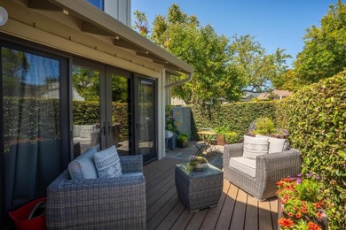 This exquisitely updated townhome enjoys privacy, sunshine, and - photo 27