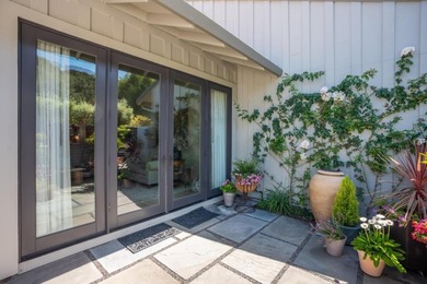 This exquisitely updated townhome enjoys privacy, sunshine, and - photo 32