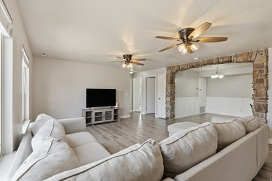 This bright and inviting 3-bedroom, 2-bathroom condo offers the - photo 7