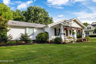 a charming cottage style home full of warmth, character, and - photo 1