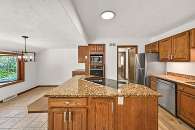 Spacious 4 bedroom, 2 full bathroom Cape Cod nestled on a - photo 11