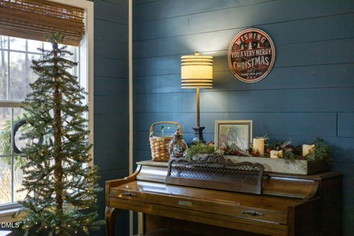 Country living at its best on this 1.50 acre lot boasting three