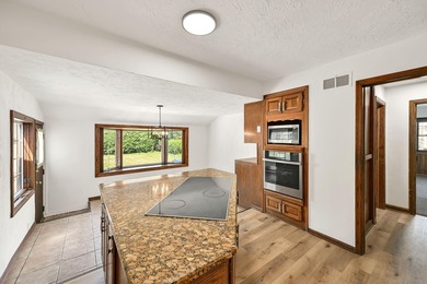 Spacious 4 bedroom, 2 full bathroom Cape Cod nestled on a - photo 12