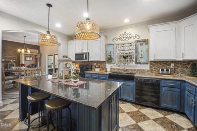 Country living at its best on this 1.50 acre lot boasting three