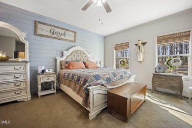 Country living at its best on this 1.50 acre lot boasting three