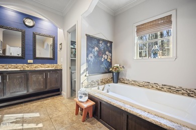 Country living at its best on this 1.50 acre lot boasting three