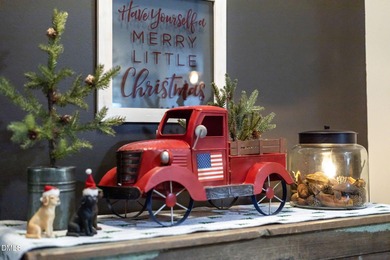 Country living at its best on this 1.50 acre lot boasting three