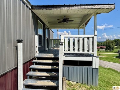 A budget-friendly mobile home on 0.27 acres inside city limits - photo 3