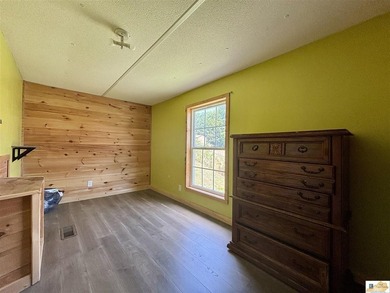 A budget-friendly mobile home on 0.27 acres inside city limits - photo 8