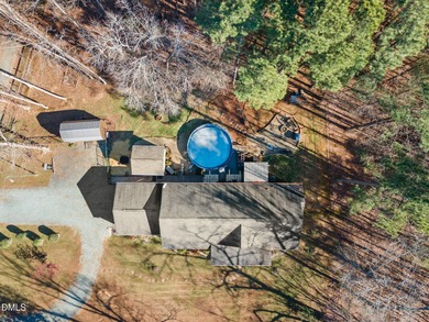 Country living at its best on this 1.50 acre lot boasting three