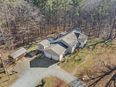 Country living at its best on this 1.50 acre lot boasting three
