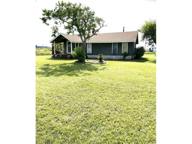 Partially remodeled two bedroom home near Aransas Bay. On three - photo 1