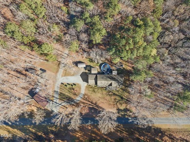 Country living at its best on this 1.50 acre lot boasting three