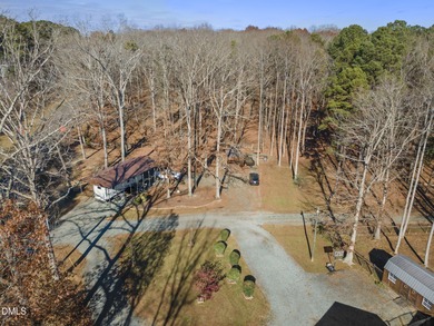 Country living at its best on this 1.50 acre lot boasting three