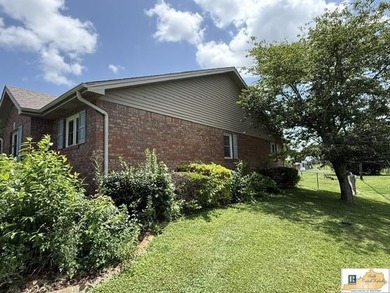 Investors take notice!! Large and beautiful brick home located - photo 2