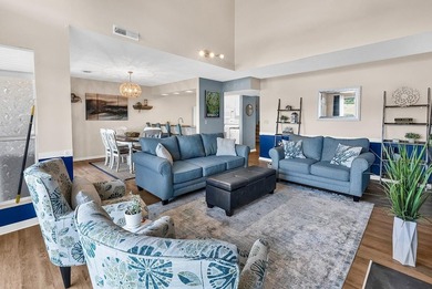 Exceptional marsh-front views, a spacious two-story layout, and - photo 13