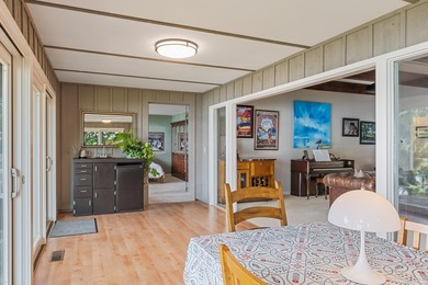This 4-bedroom, 3-bath midcentury lake home offers 100 feet of - photo 14