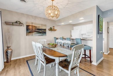 Exceptional marsh-front views, a spacious two-story layout, and - photo 15