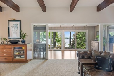 This 4-bedroom, 3-bath midcentury lake home offers 100 feet of - photo 15