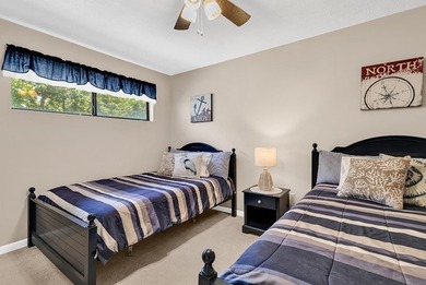 Exceptional marsh-front views, a spacious two-story layout, and - photo 18