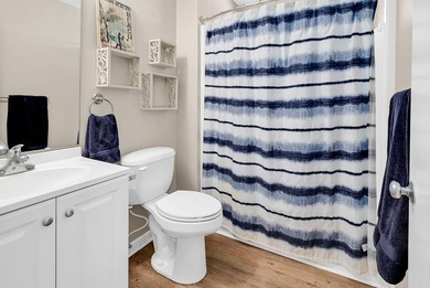 Exceptional marsh-front views, a spacious two-story layout, and - photo 19