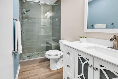 Exceptional marsh-front views, a spacious two-story layout, and - photo 20