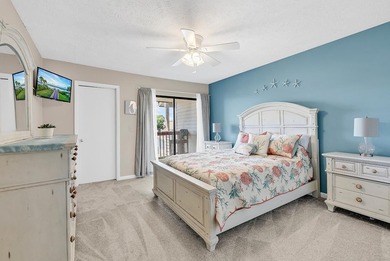 Exceptional marsh-front views, a spacious two-story layout, and - photo 21