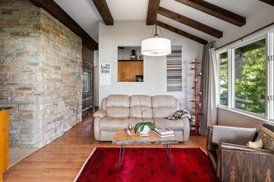This 4-bedroom, 3-bath midcentury lake home offers 100 feet of - photo 21