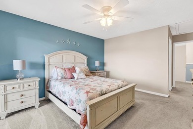Exceptional marsh-front views, a spacious two-story layout, and - photo 22