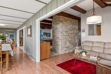 This 4-bedroom, 3-bath midcentury lake home offers 100 feet of - photo 23